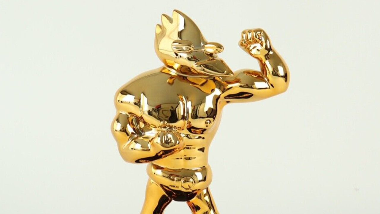 Gigantesca Statua Di Berdly Dorata